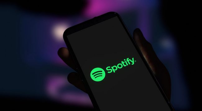 Spotify logo displayed on smartphone screen. Editorial 3d rendering.